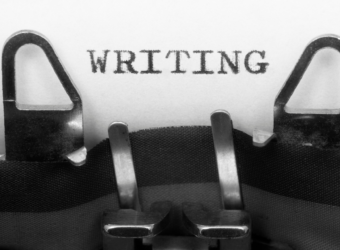 a typewriter portraying the act of writing
